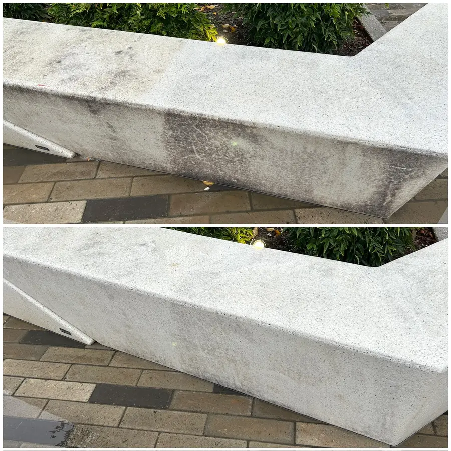 Before/after composite of a concrete plaza bench ledge, dark staining removed to clean white.